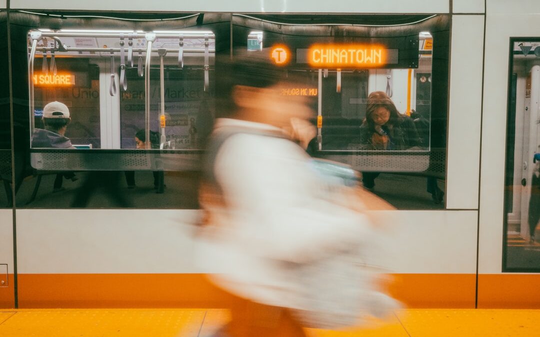 Person running past a train to get to her Naet Allergy treatment